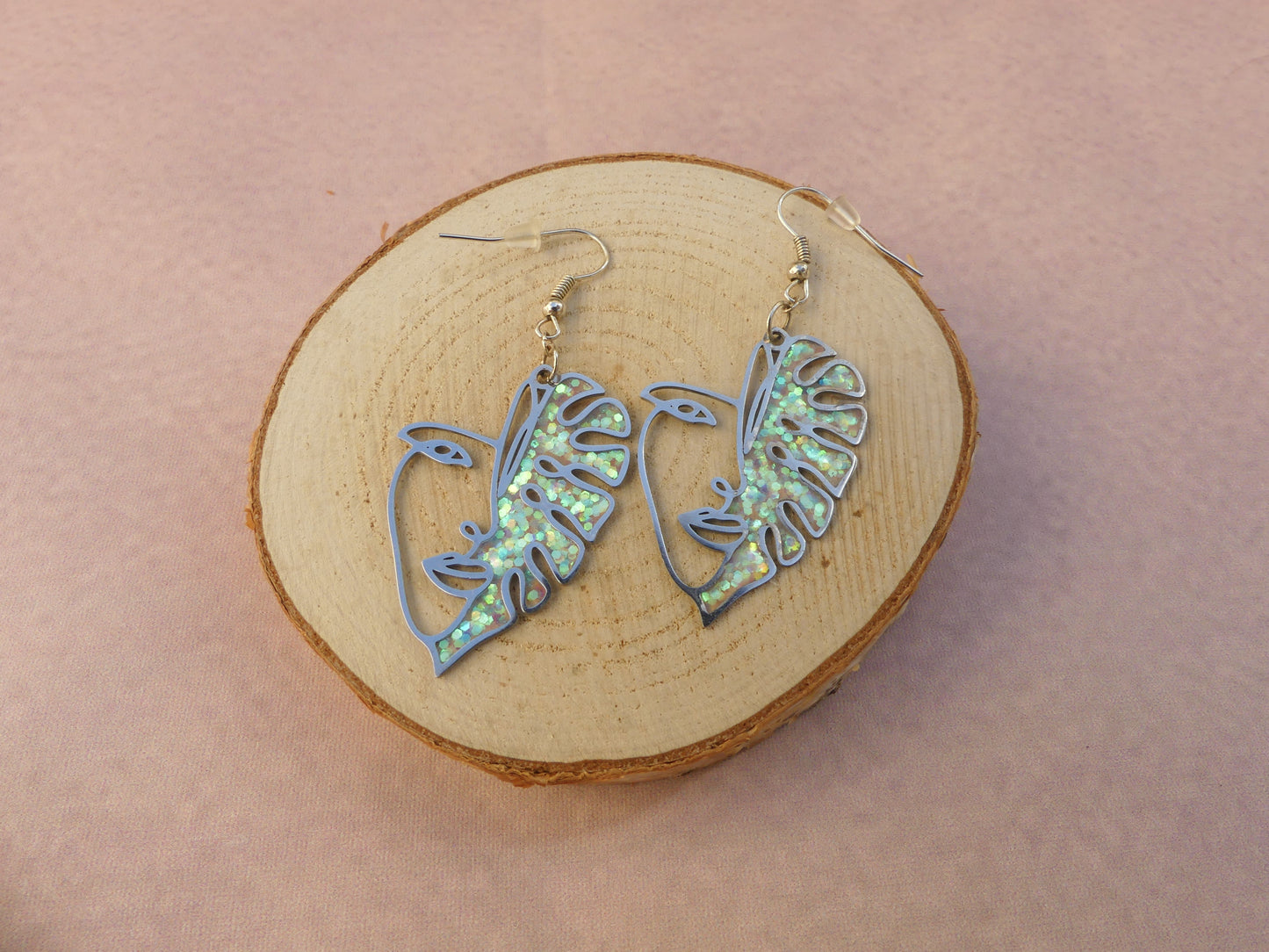 Boucles d'oreilles visage feuilles pailletées