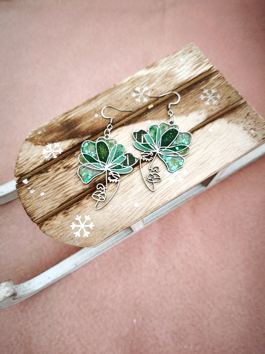 Boucles d’oreilles visages vertes