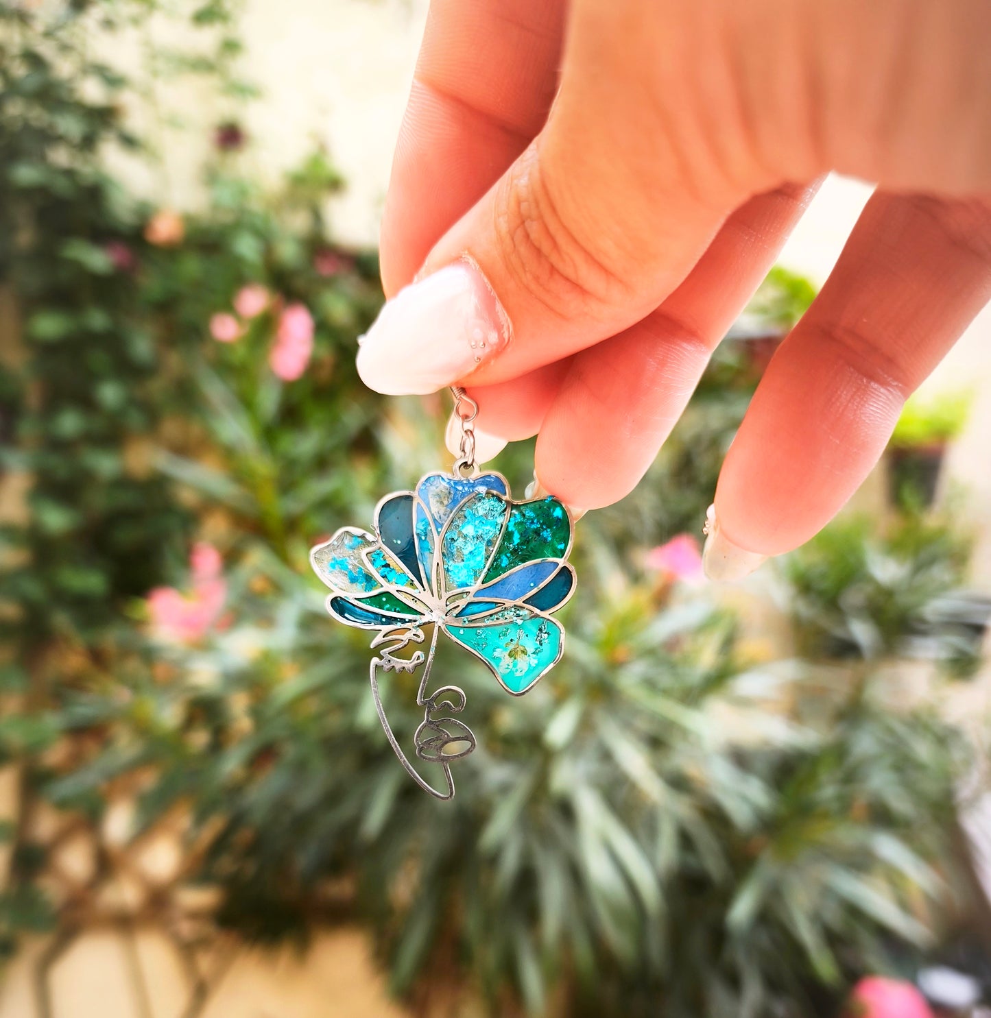 Boucles d'oreilles visages bleu