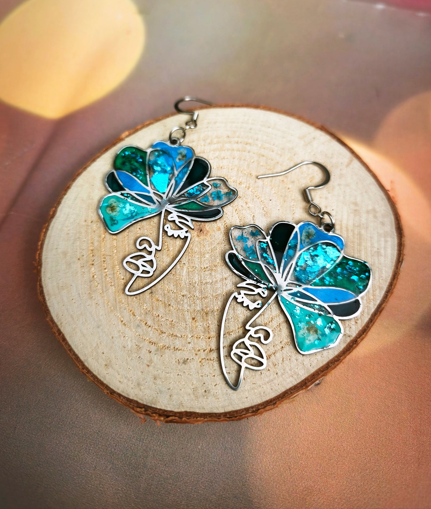 Boucles d'oreilles visages bleu