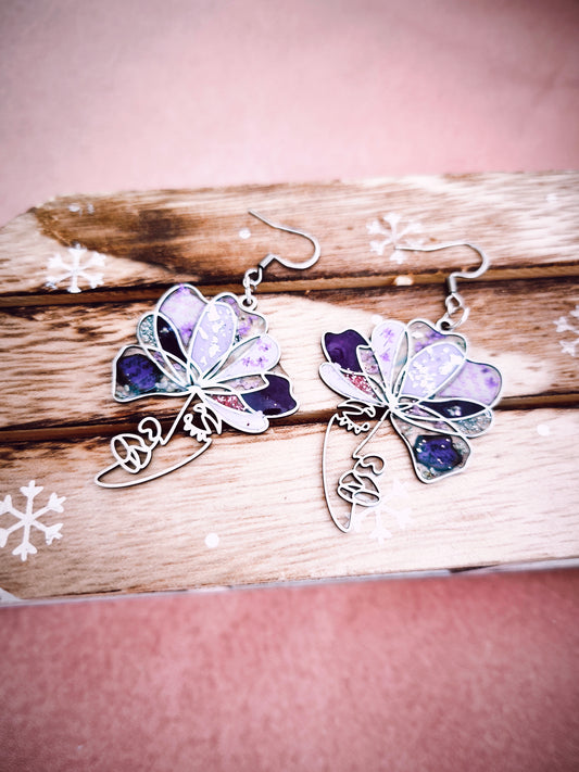 Boucles d'oreilles visage violet