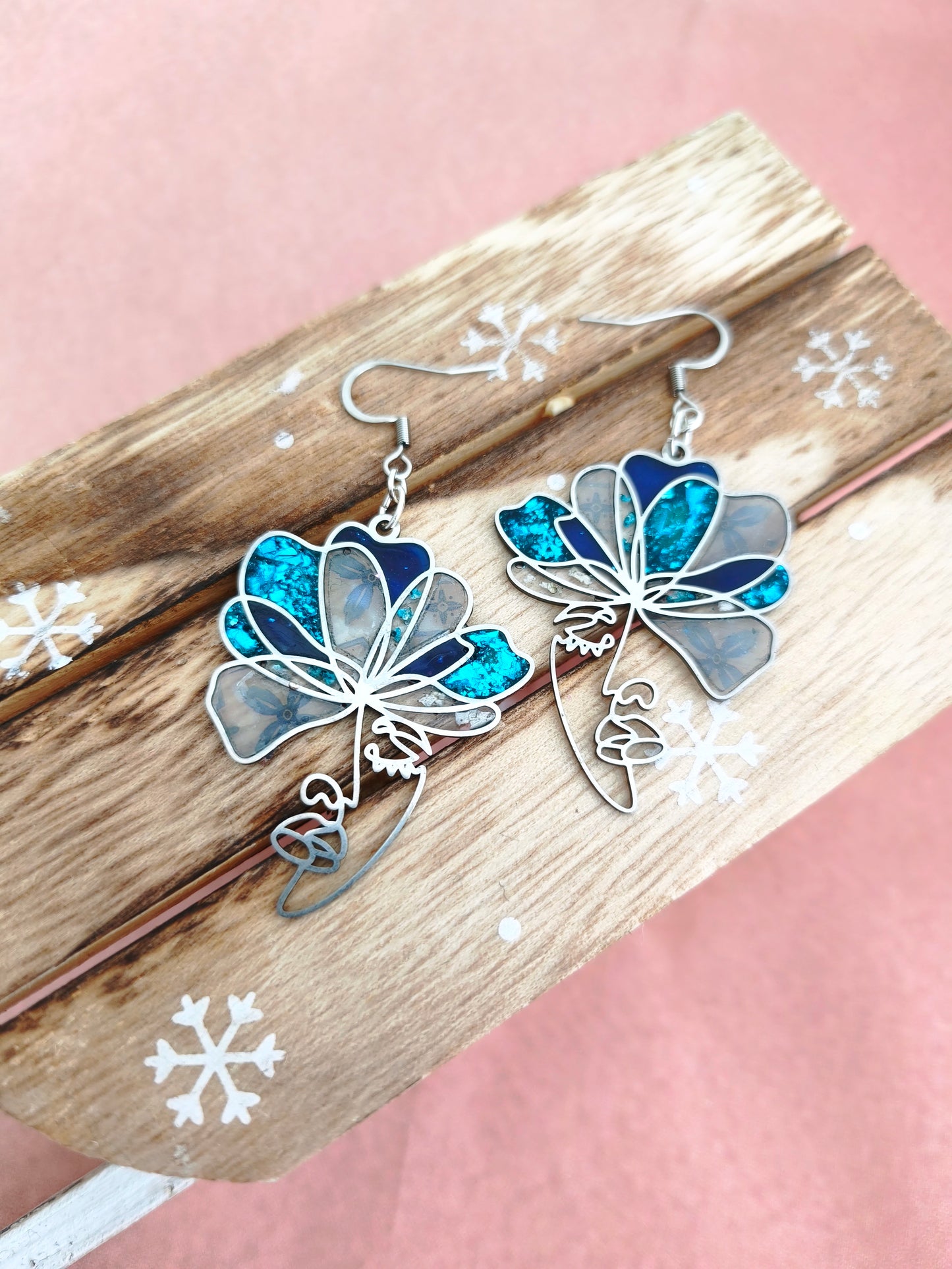 Boucles d'oreilles visages bleu