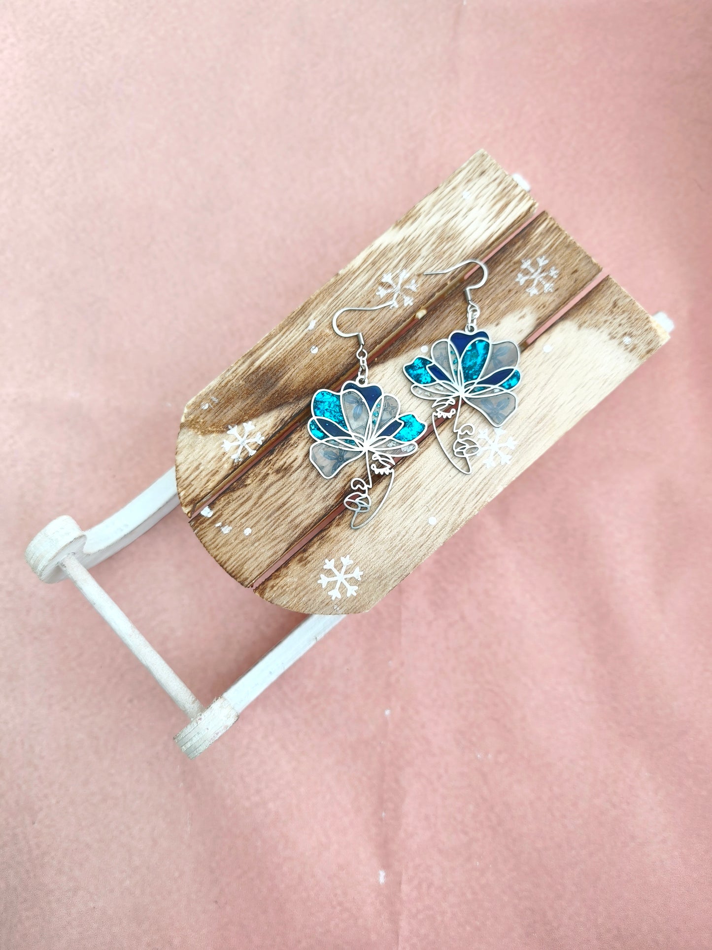 Boucles d'oreilles visages bleu